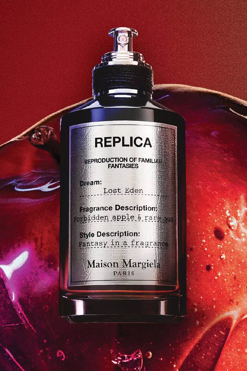 Maison Margiela Replica Lost Eden bottle on a red apple