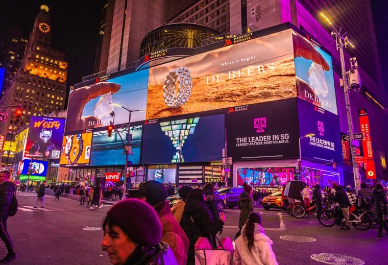 Billboards lit up in Times Square at night